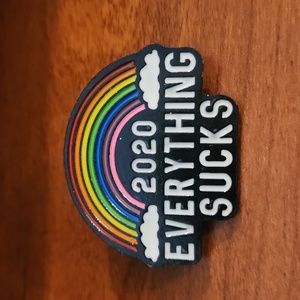 Large Rainbow Lapel Pin Proclaiming "2020 Everything Sucks"